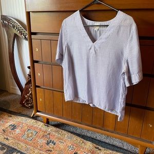 Very thin breezy white and blue striped top. Perfect for summer ☀️